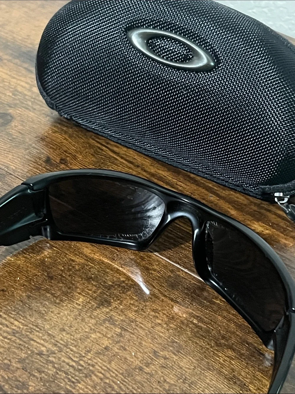 Oakley Black Sunglasses with Dark Lenses